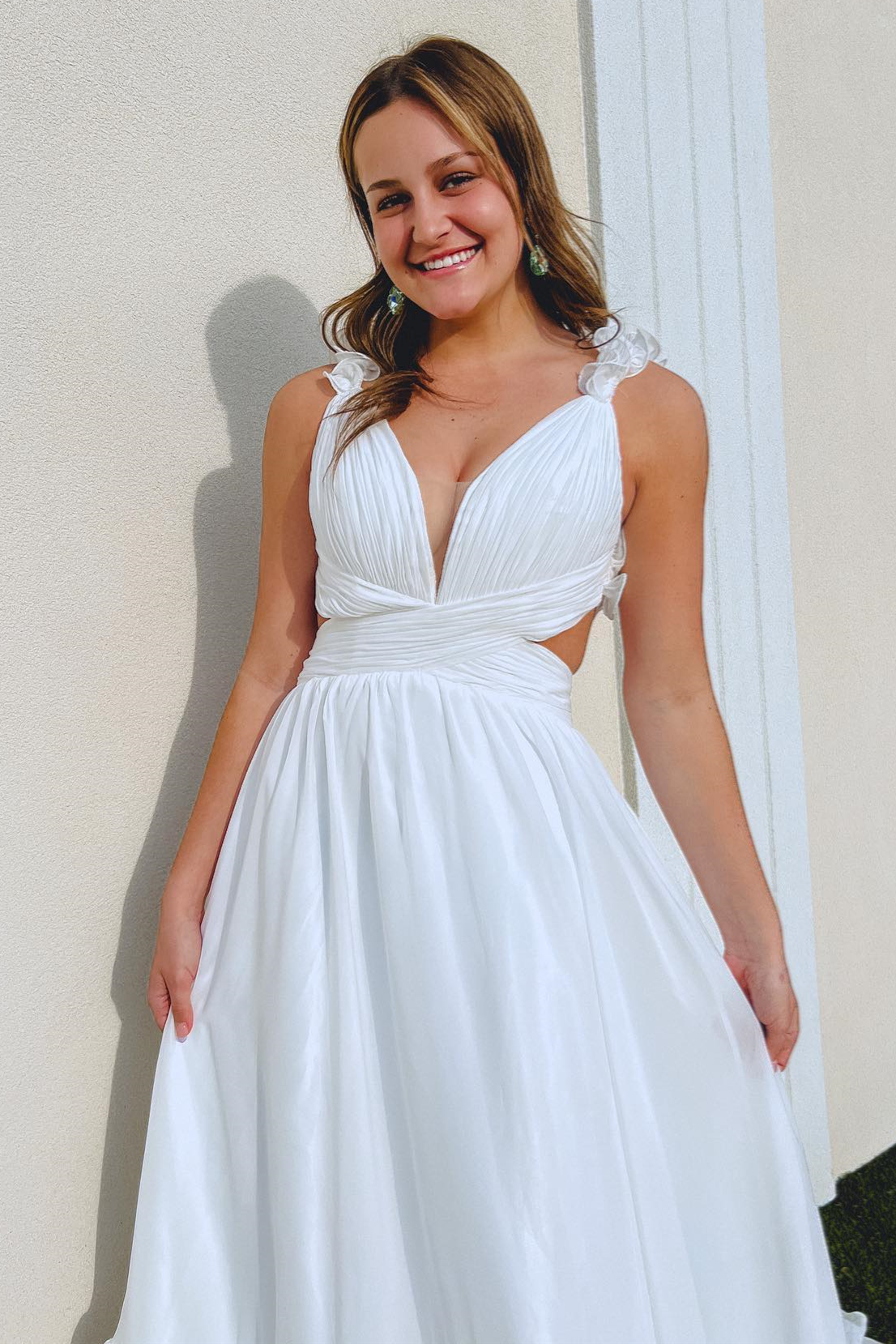 White A-Line Prom Dress with Ruffle Straps, Pleated Cut-Out, and Deep V Neck